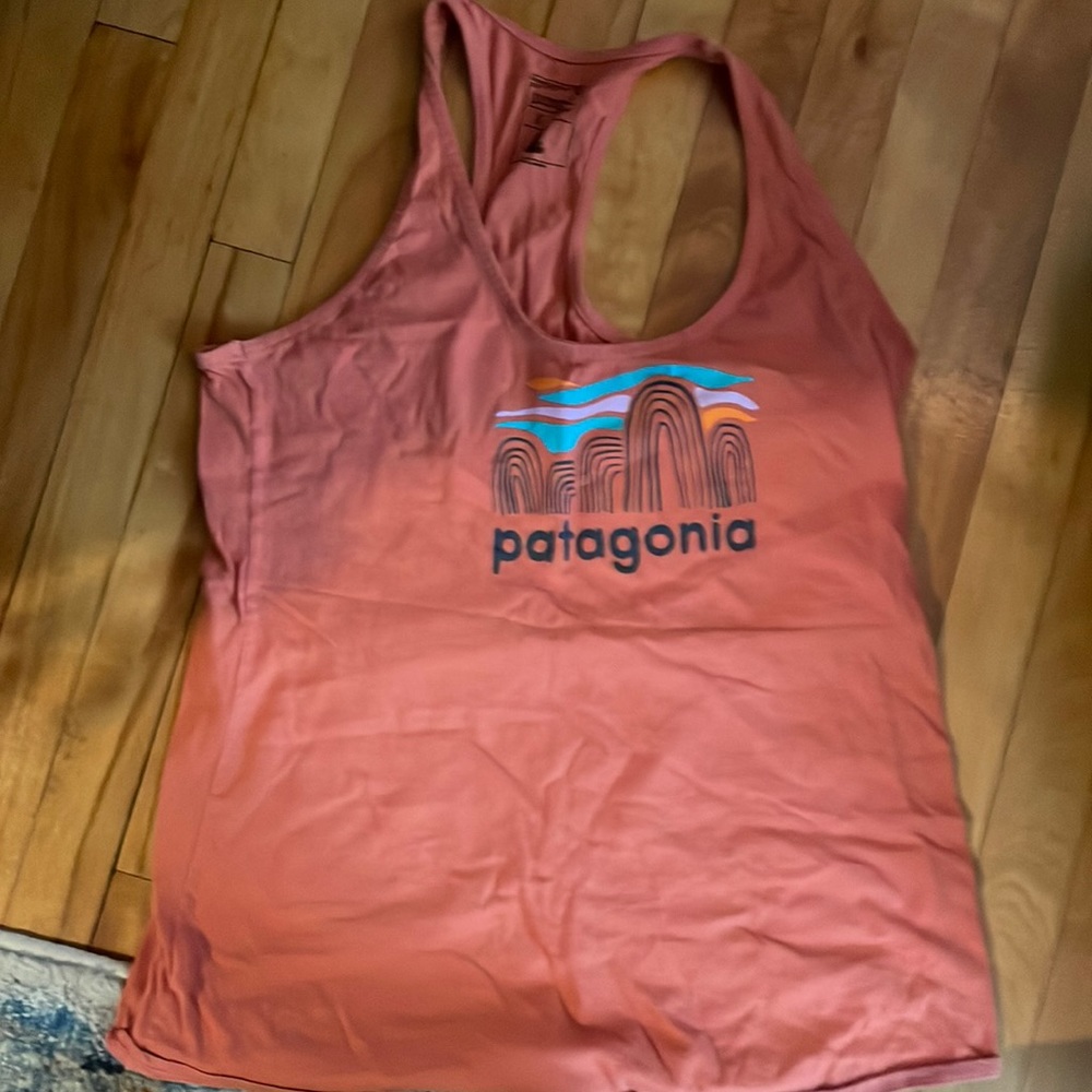 Patagonia , small, orange tank